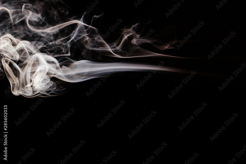 Wall mural brown wavy smoke on black background