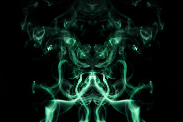 Fototapeta premium Green wavy smoke on black background