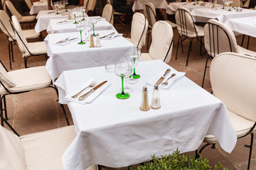 Empty Tables in outdoors street restaurant
