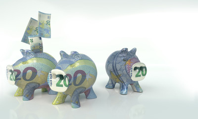 Drei kleine Sparschweinchen mit zwanzig Euro 