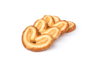 Palmier cookies or puff pastry ears isolated on white background.