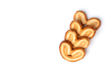 Palmier cookies or puff pastry ears isolated on white background.