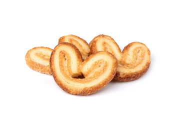 Palmier cookies or puff pastry ears isolated on white background.