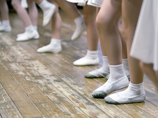 Girls in ballet school. Image of legs, close-up