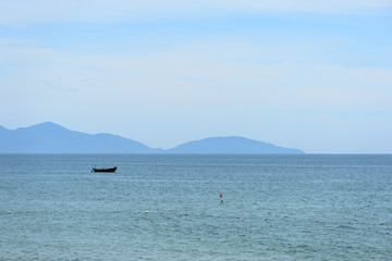 Morning sea landscape with views of the islands and boats. Hoi An, Vietnam