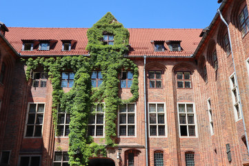 The Gothic Old Town Hall (Ratusz Staromiejski) in Torun, Poland. August 2019