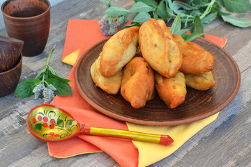 Food concept, pies, slavonic kitchen, still life in russian rustic village, spoon khokhloma