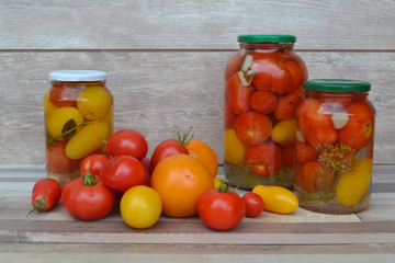 Pickled tomatoes in a jar, red and yellow tomatoes, conservation, ussr, tasty tomatoes, tomatoes for the winter