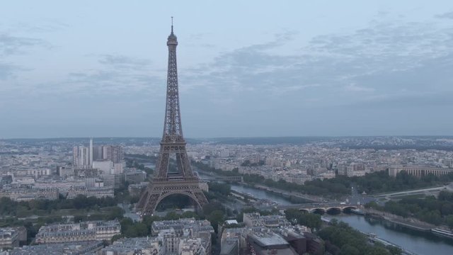 Aerial drone footage of the famous Eiffel Tower in Paris, France in the morning