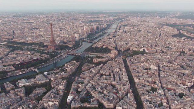 aerial drone shot towards the Eiffel Tower in Paris, France on an overcast day
