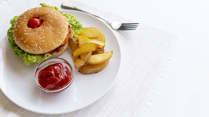 Close-up hamburger with fries