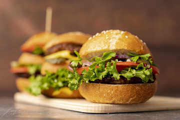Close-up hamburgers on cutting board