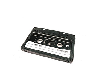Fototapeta premium Close up image of a vintage audio cassette tape isolated on white background. Top view