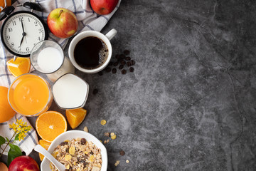 breakfast table with clock in morning time, copy space.