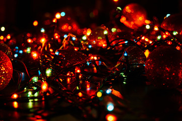 Horizontal bright Christmas garlands and Christmas decorations. Background bright rich color composition design concept