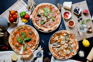 pizza with salami and tomatoes