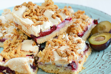 Plum cake. Homemade shortcrust pastry with purple plums.