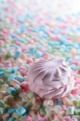 Close up of various colorful marshmallows.