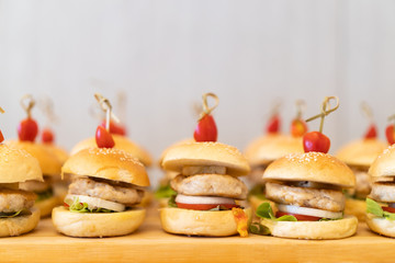 Many mini meat burger at the table in the hotel.