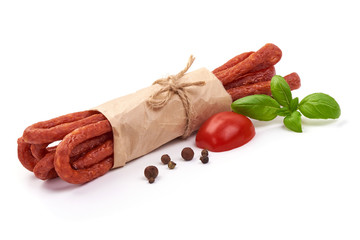 Polish dry cured Kabanos sausage, isolated on white background