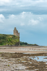 The Ancient Ruins of Greenan Castle looking over From Greenan Bay in Ayrshire Scotland