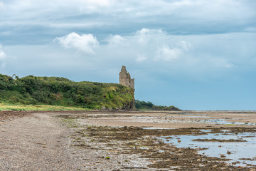 The Ancient Ruins of Greenan Castle looking over From Greenan Bay in Ayrshire Scotland