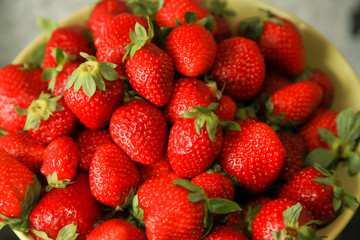 background from freshly harvested red strawberries