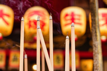 burning incense sticks in the temple, Malacca, Malaysia 