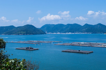 Fototapeta na wymiar 【岡山県】牡蠣の養殖いかだ / 【Okayama】Raft for cultivating oysters