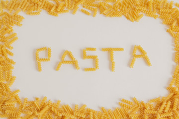 Inscription pasta on white background and frame around.Top view. Copy, empty space for text