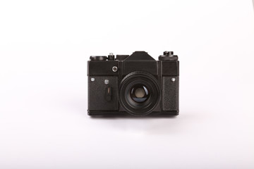 Old film camera on white background