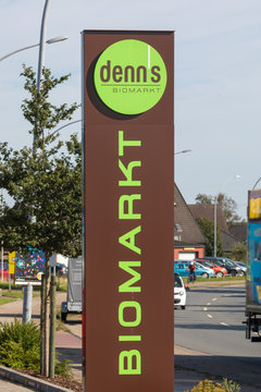 Stade, Germany - August 22, 2019: Signage on pole iddentifying a denn&rsquo;s Biomarkt store. denn&rsquo;s is a brand of Dennree Gruppe seated in T&ouml;pen, Germany