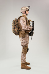 Rear view of military soldier US army marines operator studio shot portrait