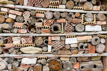Insect hotel made of bricks, stones and wood