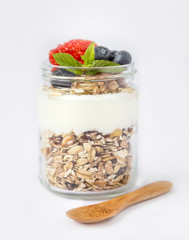 Healthy breakfast with yogurt, muesli, berries and strawberries