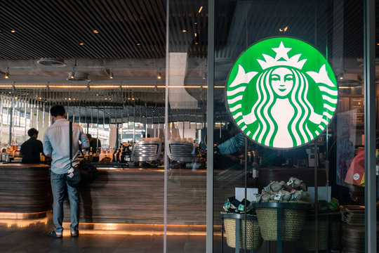 Bangkok, Thailand - April 20, 2018 : Starbucks coffee logo in front of the shop.