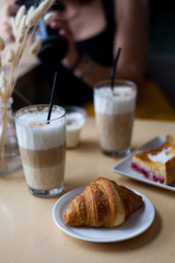 cup of coffee with cookies