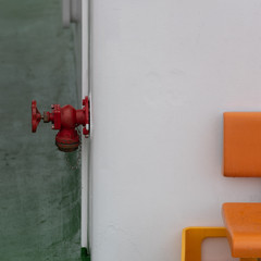 red hydrant on a ferry