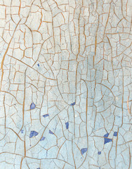 Cracked paint on wooden background, texture. Vintage wallpaper