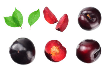 fresh plum fruit with green leaf and cut plum slices isolated on white background. top view