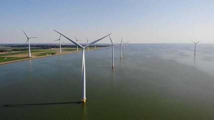 Wind turbine from aerial view, Drone view at windpark westermeerdijk a windmill farm in the lake IJsselmeer the biggest in the Netherlands,Sustainable development, renewable energy