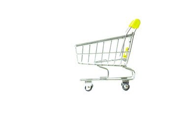 Miniature shopping cart isolated on white background.