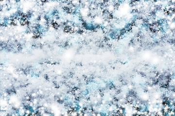 The surface is coveredwith snow. Winter defocused background