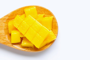 Tropical fruit, Mango on wooden spoon on white background.