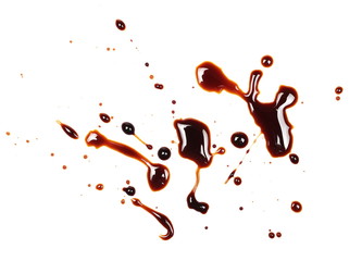Spilled soy sauce, isolated on white background, top view