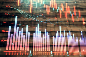 Financial chart hologram with abstract background. Double exposure. Concept of market analysis