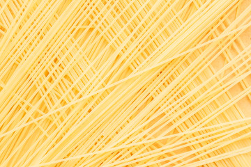Background and texture of dry Italian pasta, spaghetti