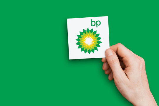 LONDON, UK - October 26th 2018: Hand holding a BP logo. BP is an oil and gas company based in th UK.
