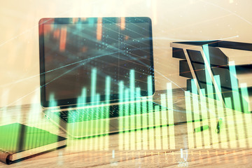 Stock market chart and desktop office computer background. Multi exposure. Concept of financial analysis.