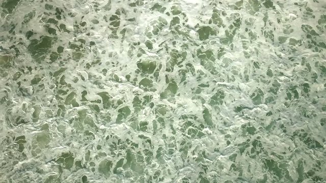 Foamy turbulent sea aerial view
